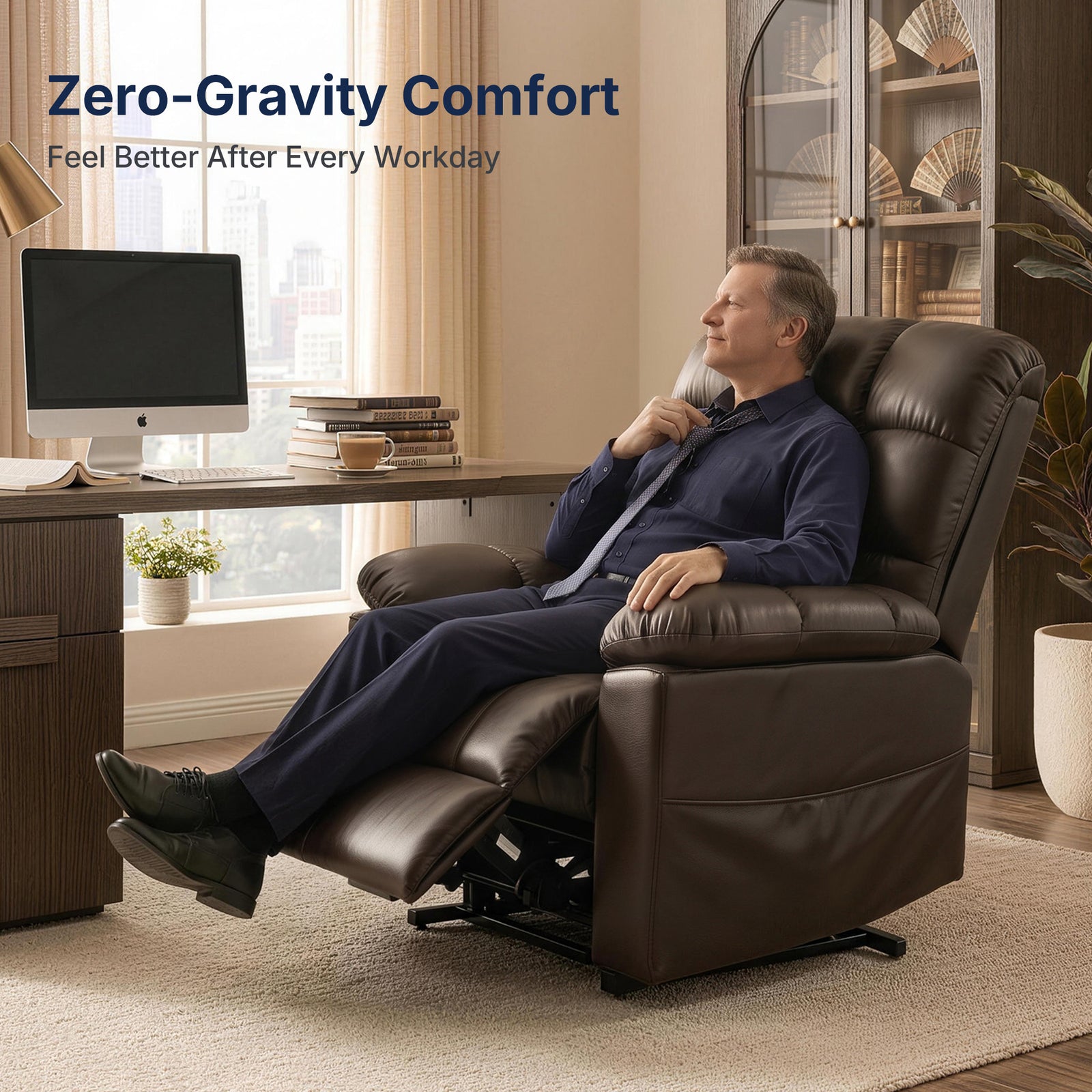 Office lifestyle promotional banner with headline "Zero-Gravity Comfort" and subtext "Feel Better After Every Workday", middle-aged businessman relaxing on zero-gravity tilted dark brown tufted faux leather power lift recliner chair, wooden office desk with iMac, cityscape window view, warm neutral home office interior decor